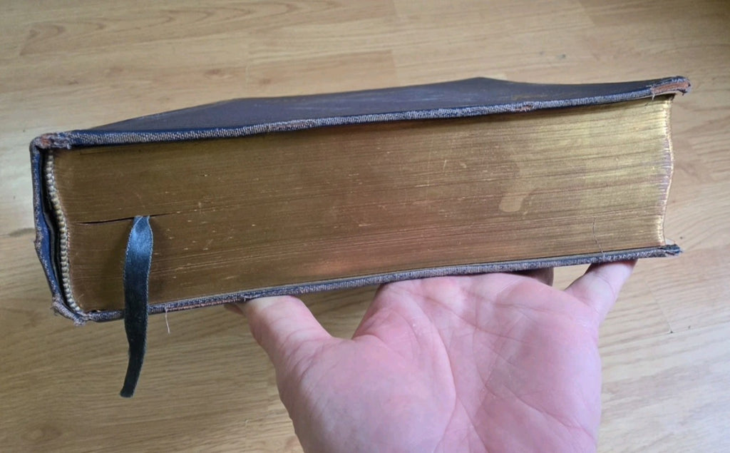 Gilt page edges and ribbon marker