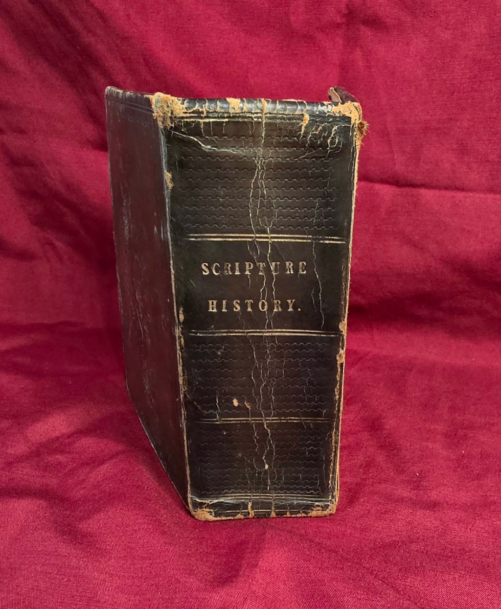 Antique Scripture History volume, worn leather spine with gilt title