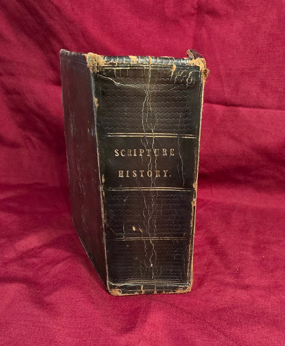 Antique Scripture History volume, worn leather spine with gilt title